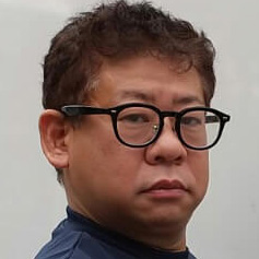 担当